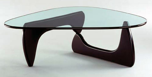 A Noguchi Coffee Table showing its distinctive interlocking wooden base
