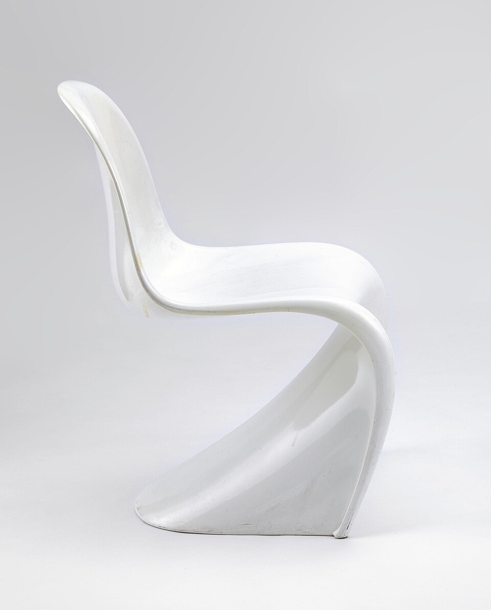 A white Panton Chair showing its distinctive S-curve shape
